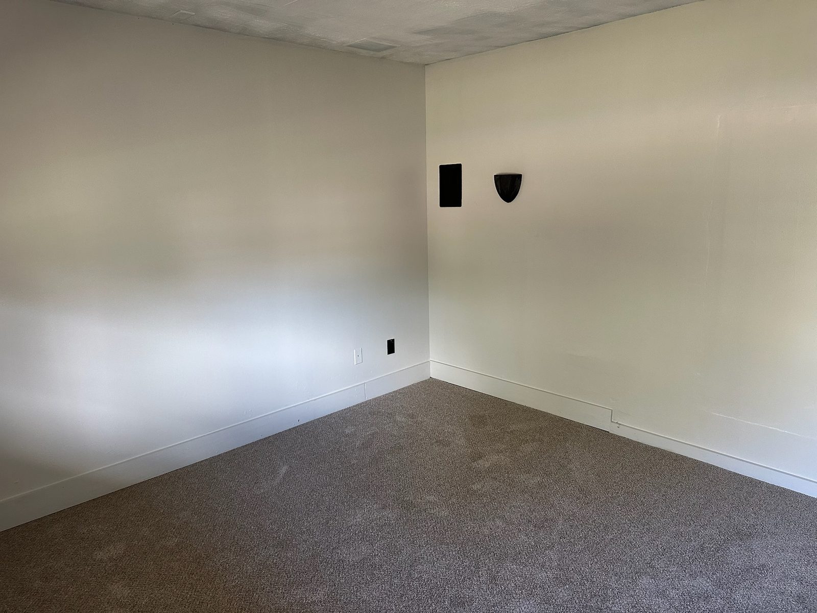 Cream walls and white trim after interior painting